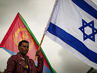 Просители убежища проводят демонстрацию возле консульства Руанды в Герцлии