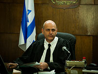 Президент окружного суда обвиняется в том, что разговаривал за рулем по сотовому телефону 