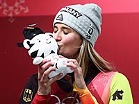 Командные соревнования саночников выиграла сборная Германии