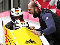 Бобслей. Победили немки.  Россиянки на 12-м месте, пара на Нигерии - на 20-м месте